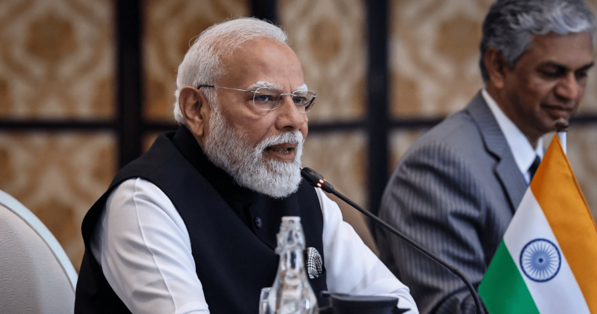 India’s Modi advances plan to expand Parliament and reserve seats for women amid opposition protests