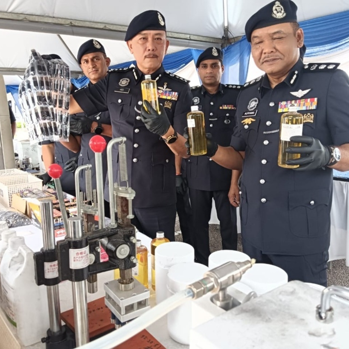 Johor police raid drug lab, seizing RM16.4 million worth of vape cartridges laced with narcotics.