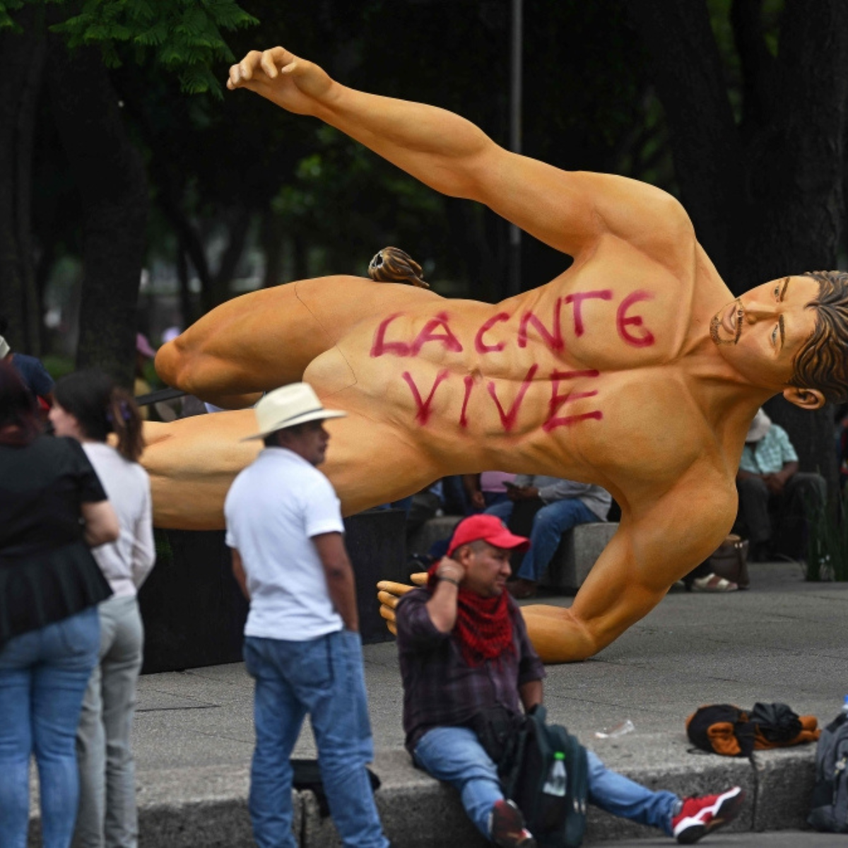 Teachers protesting in Mexico topple player statues ahead of World Cup