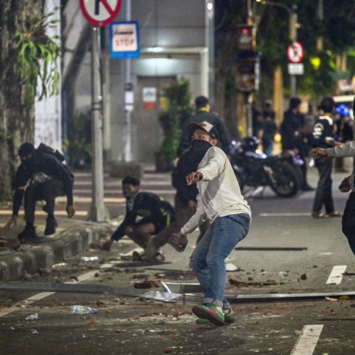 Indonesia charges four individuals after fuel price protests turned violent.