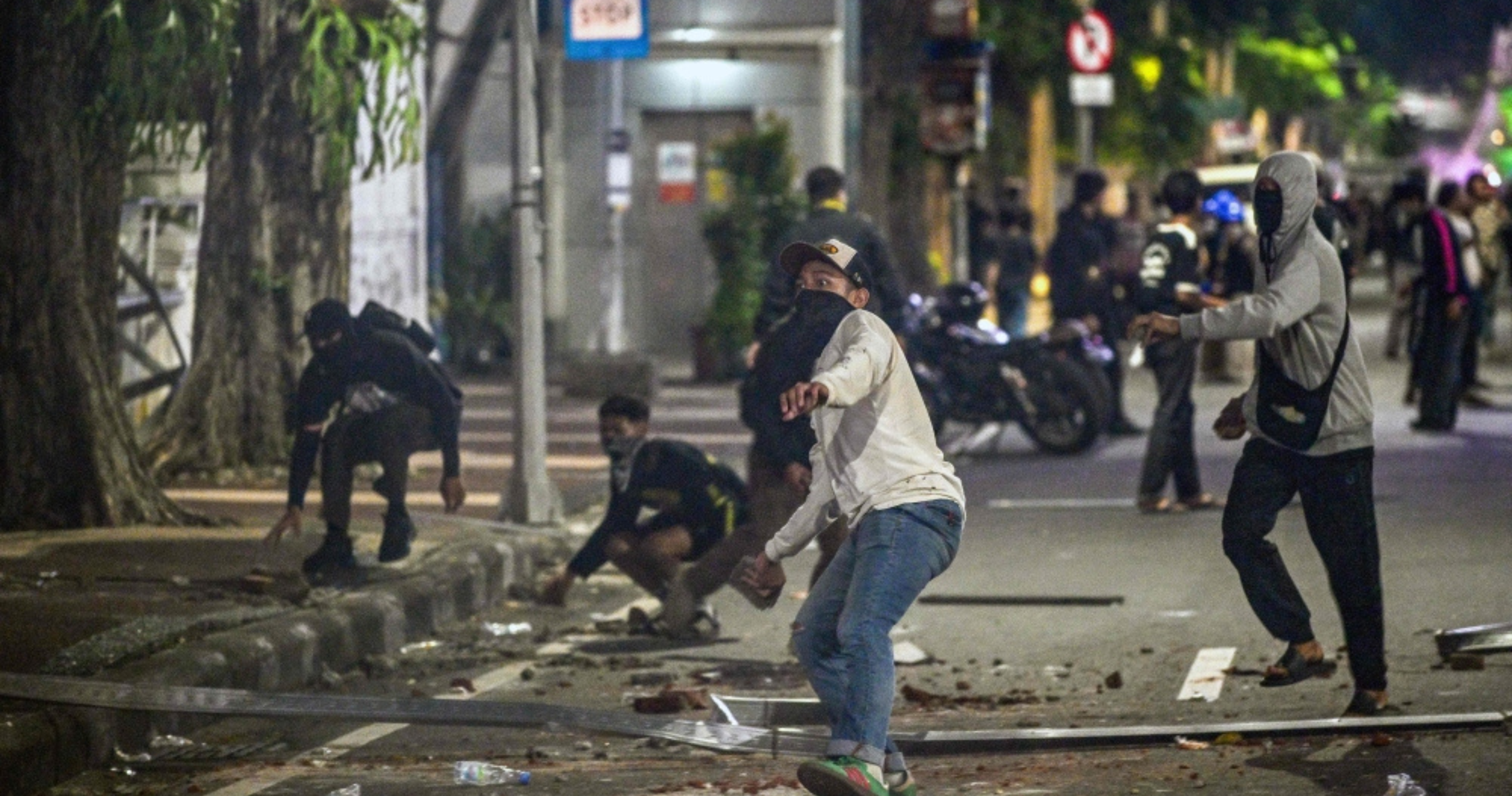 Indonesia charges four individuals after fuel price protests turned violent.