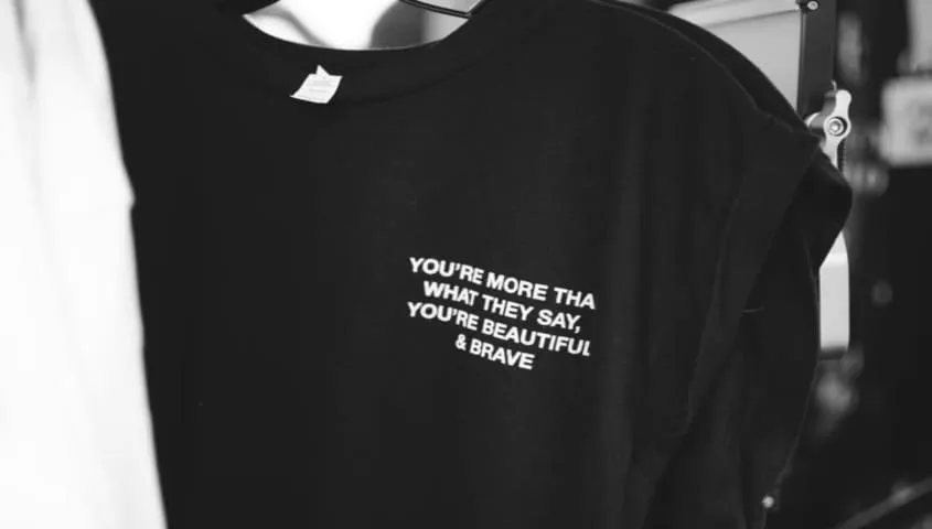 close-up of a slogans t-shirt print highlighting t-shirt design ideas