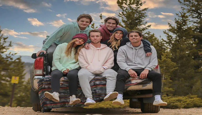group of models wearing hoodies as things to sell to make money