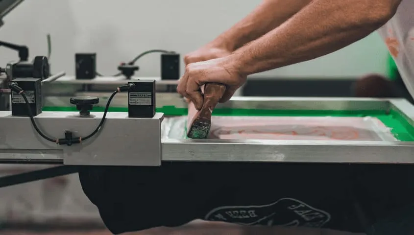Custom T-shirt designs created using screen printing templates