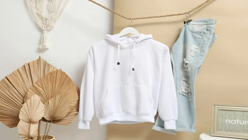 A white cotton hoodie and jeans