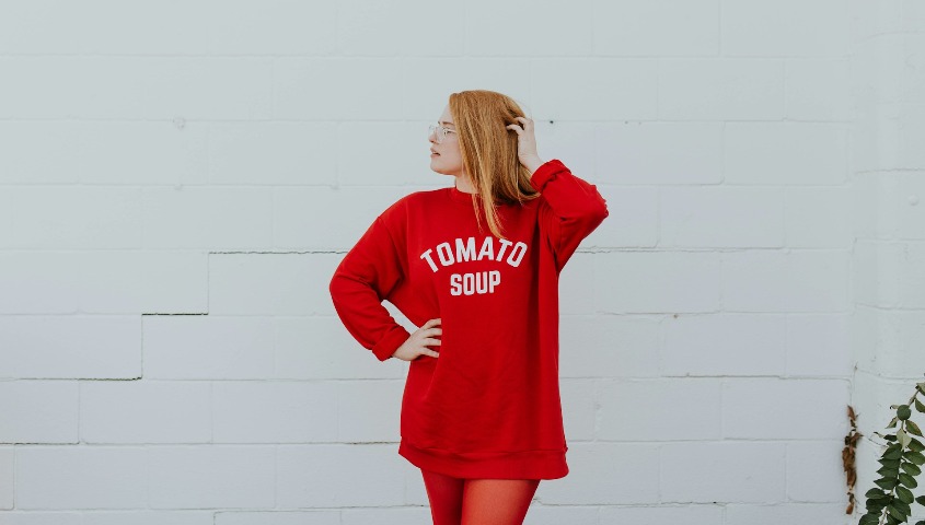Blonde girl in her red custom hoodie