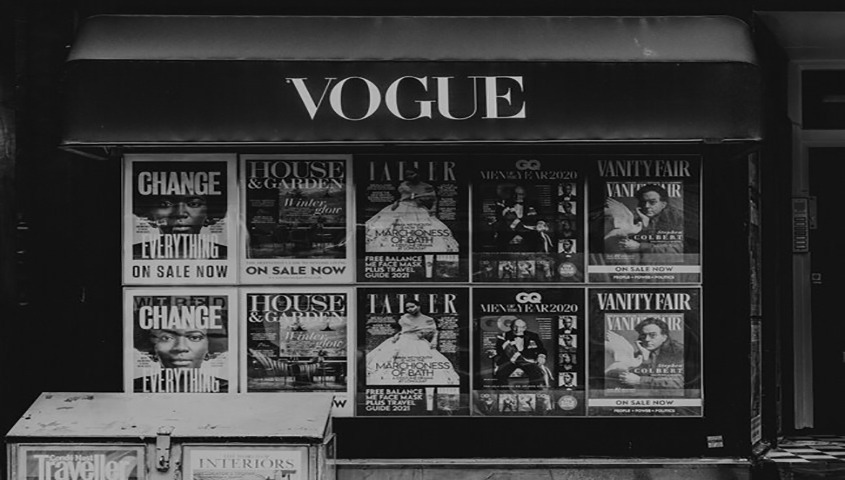 The exterior of a Vogue store showcasing its iconic brand name