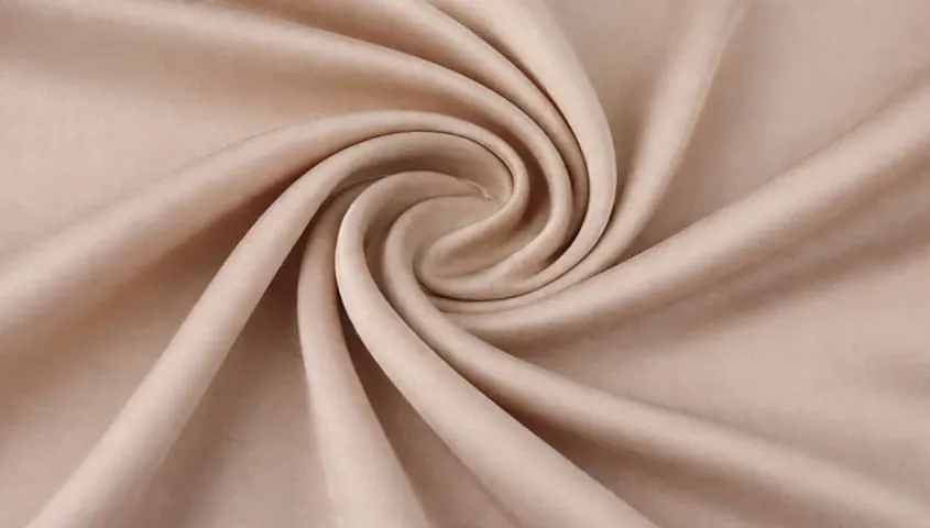 Lyocell fabric with smooth drape showing an eco-friendly type of fabric used in clothing.