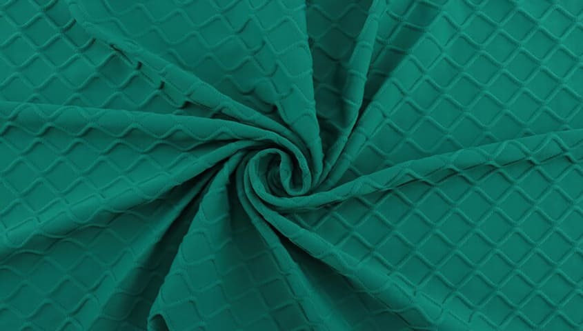 Spandex elastane fabric with stretch texture showing a flexible type of fabric used in clothing.