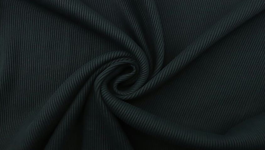 Modal fabric with a soft, smooth drape showing a breathable type of fabric used in apparel.