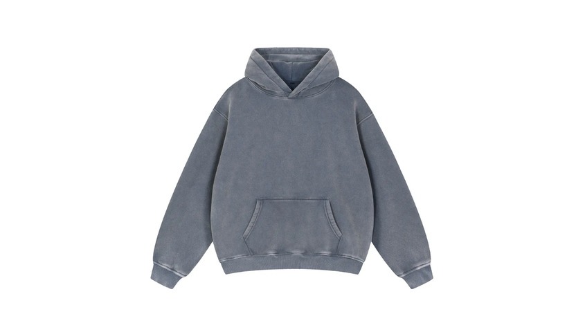 Vintage wash oversized hoodie paired with cargo pants reflecting classic 90s fashion trends.