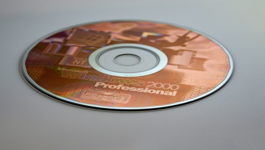 Y2K CD representing trending shirt designs and early 2000s t shirt trends