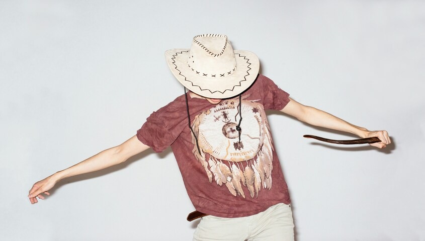 Cowboy graphic t-shirt representing trending shirt designs and western-inspired t shirt trends