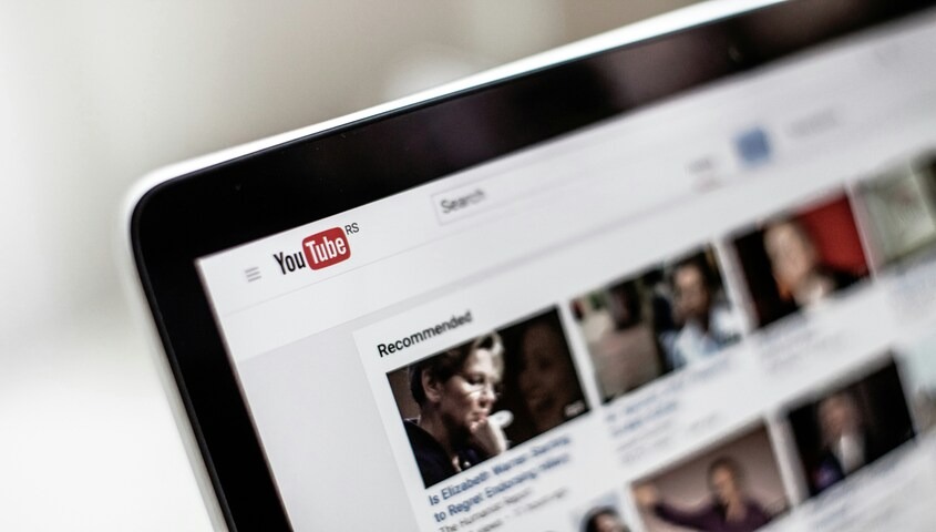 Faceless YouTube channel on laptop, one approach to how to make an extra $2000 a month