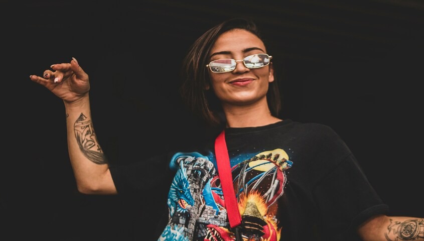 Streetwear graphic tee on a model, the kind of custom t-shirts under $10 no minimum that actually convert