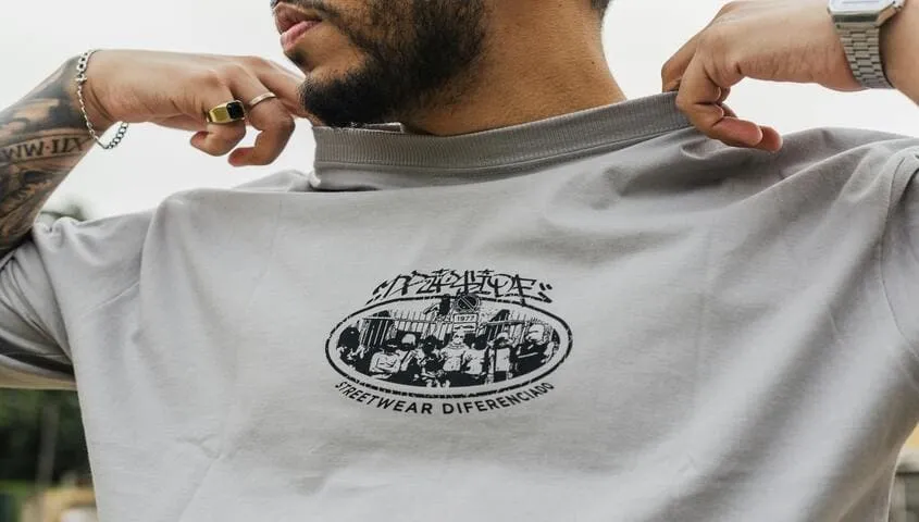 showing the center chest logo placement on shirt