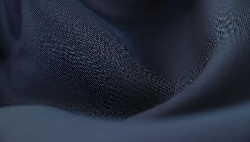 Close-up of polyester fabric showing what polyester is made of at the fiber level