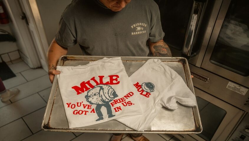 Custom-printed t-shirts with original artwork, one of the fastest creative ways to make money as an artist.