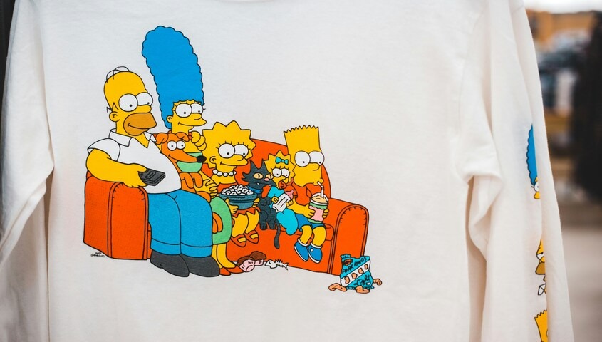 Cartoon family illustration printed on a long-sleeve tee, one of the most talked-about family reunion t shirt ideas of the year.