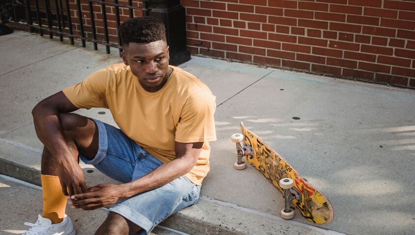 Garment-dyed heavyweight tee worn on the street, the vintage depth that ranks among the best t shirts for men.