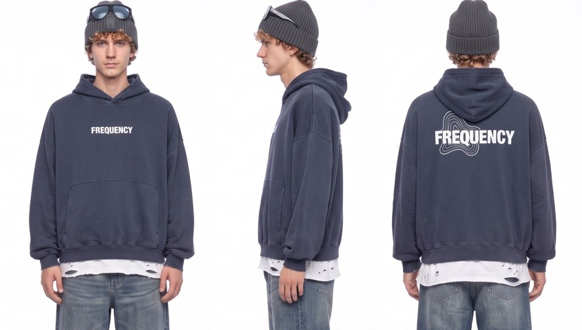 Model wearing an oversized navy hoodie shown from the front, side and back to assess fit