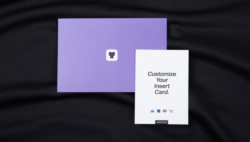 Custom insert cards placed on black fabric