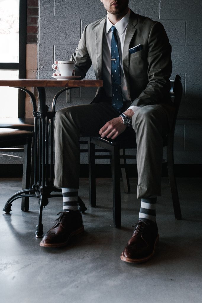 A entrepreneur waiting for a meeting with a coffe.