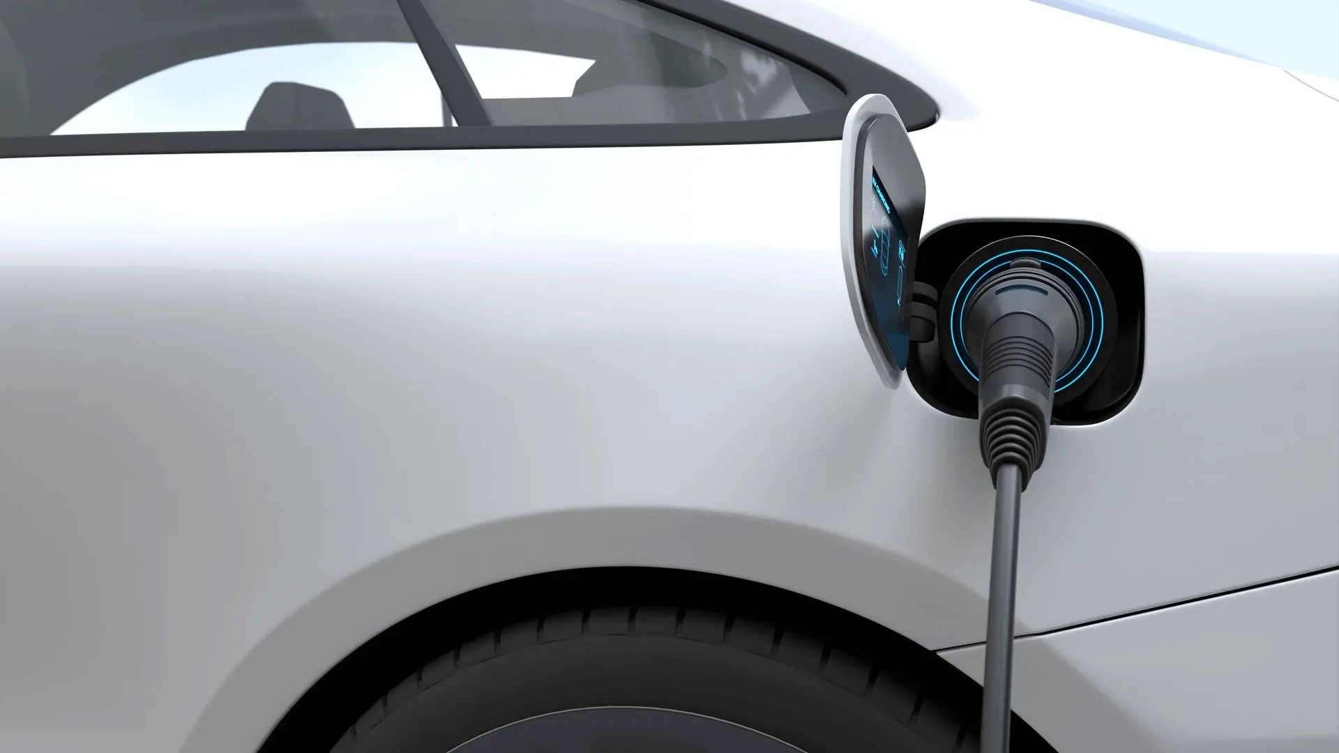 Close up of a white electric car being charged. 