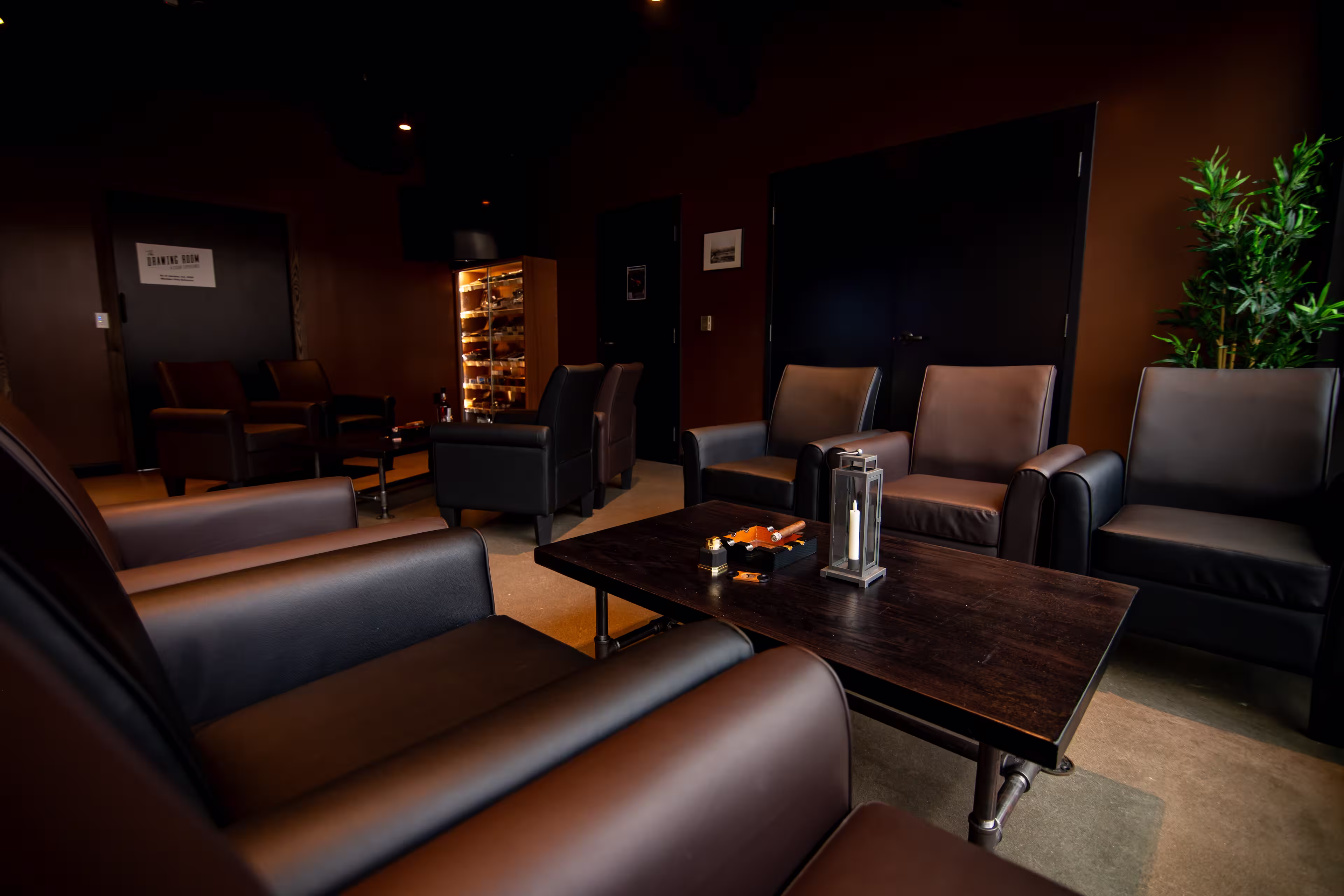 Leather upholstered seating and backlit humidor