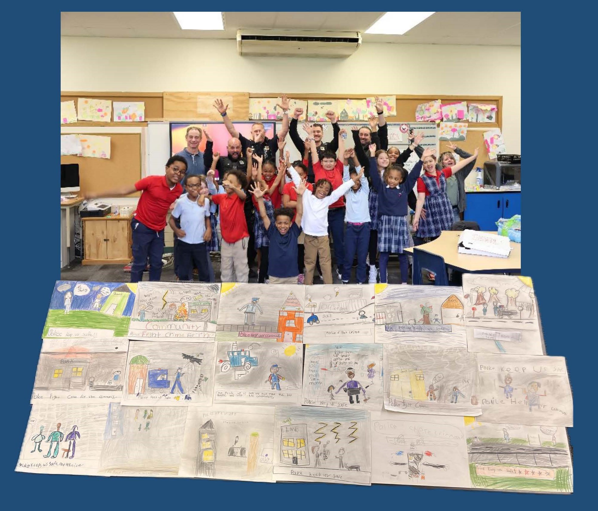 Group of smiling children and adults in a classroom behind a display of colorful drawings about community and police safety.