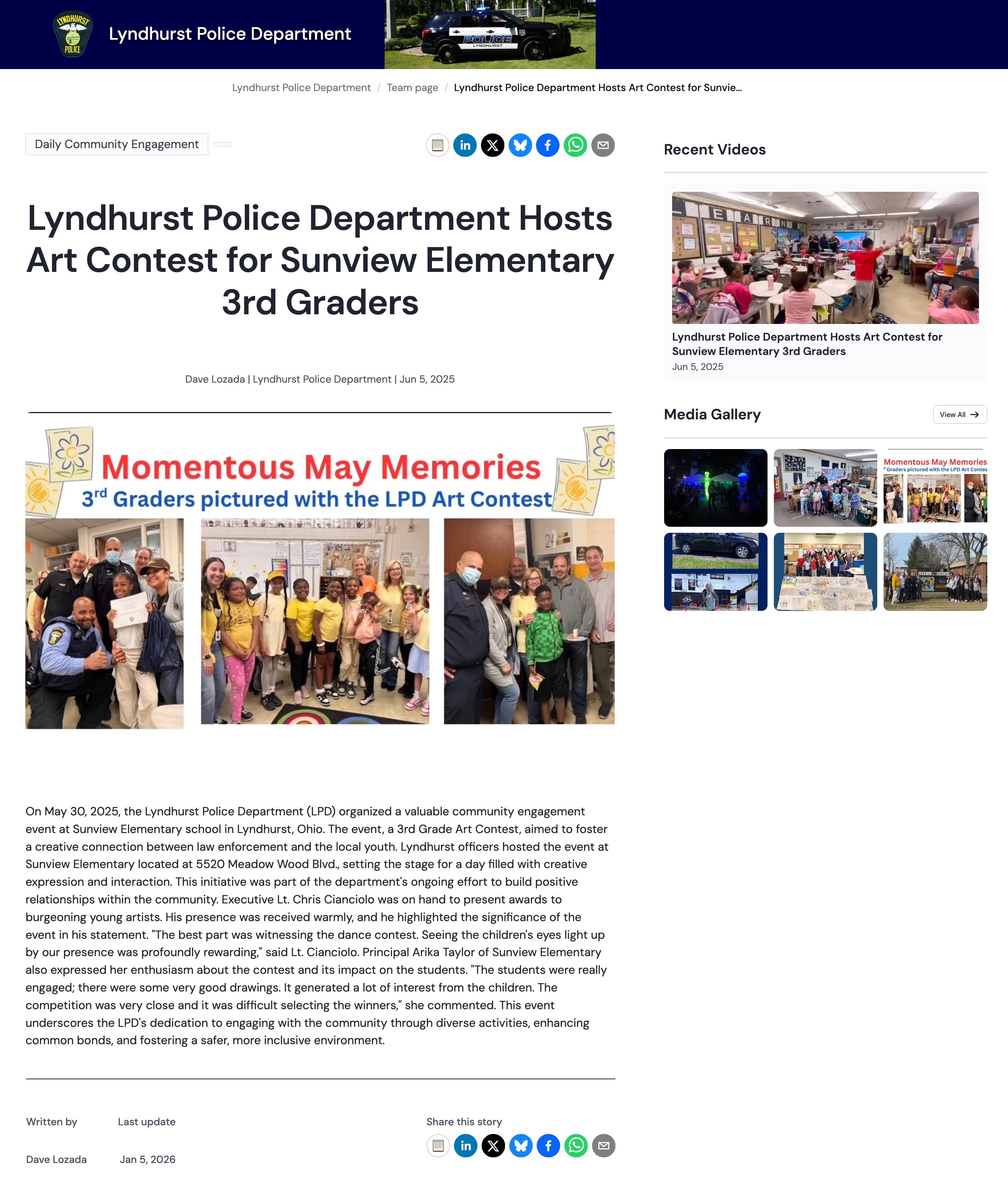 Lyndhurst Police officers and Sunview Elementary 3rd graders posing together during an art contest event.