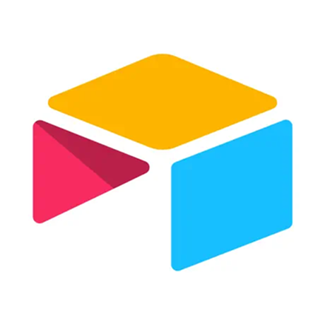 Colorful abstract geometric shapes forming a cube-like icon with yellow, red, and blue segments. Airtable logo. 