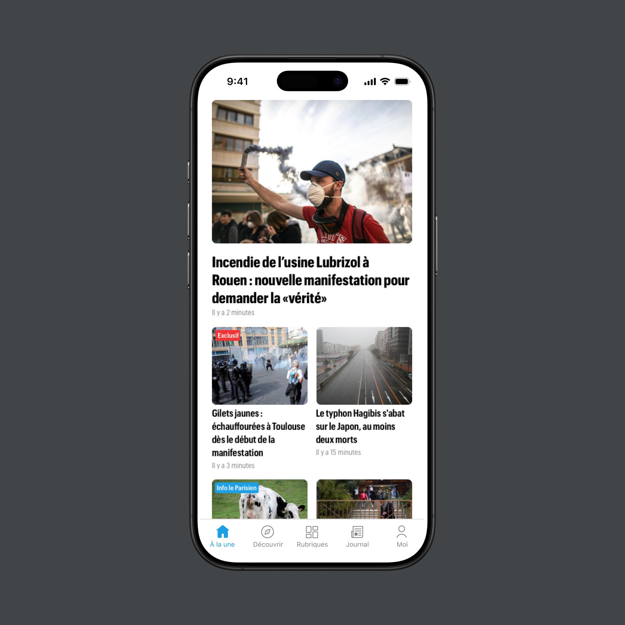 Mobile phone screen displaying news headlines in French about protests and a typhoon, with images of a masked protester holding a smoke flare, police, empty street, and cows.