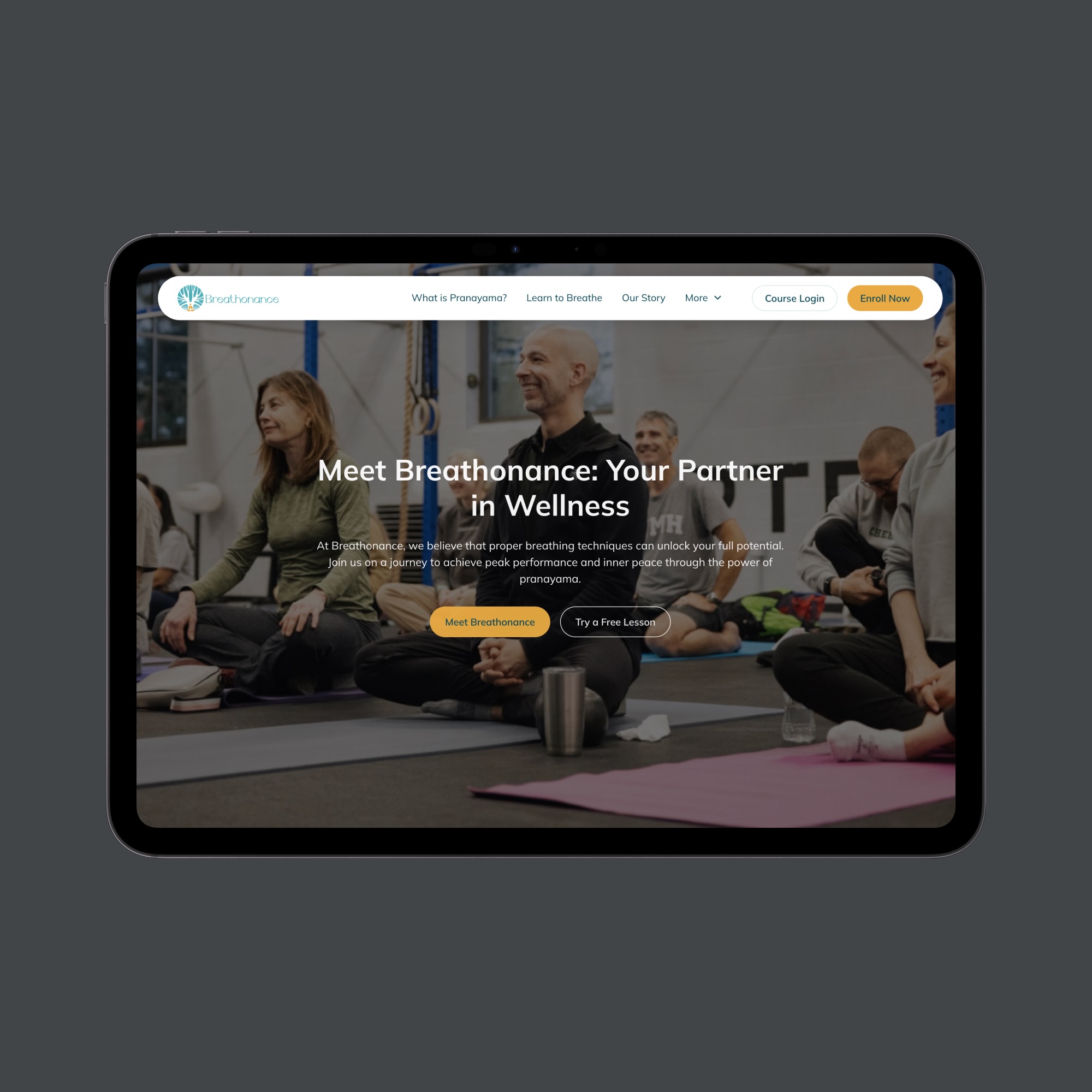 Website homepage on a tablet showing people sitting on yoga mats in a breathing class with headline 'Meet Breathonance: Your Partner in Wellness'.