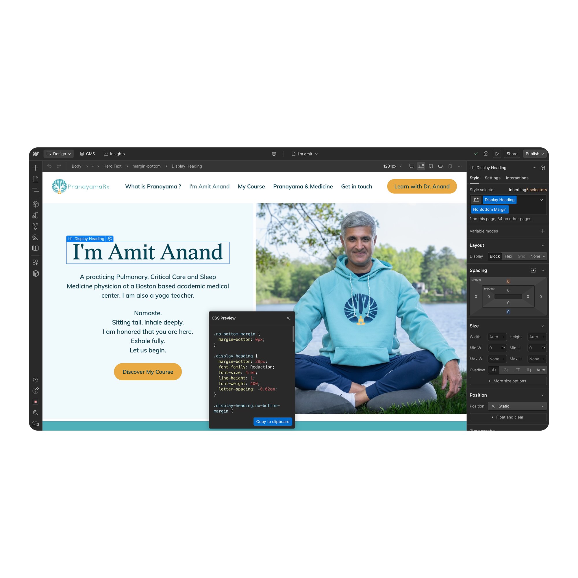 Website interface showing a webpage editor with header text 'I'm Amit Anand' and a photo of a man sitting cross-legged outdoors wearing a teal hoodie.