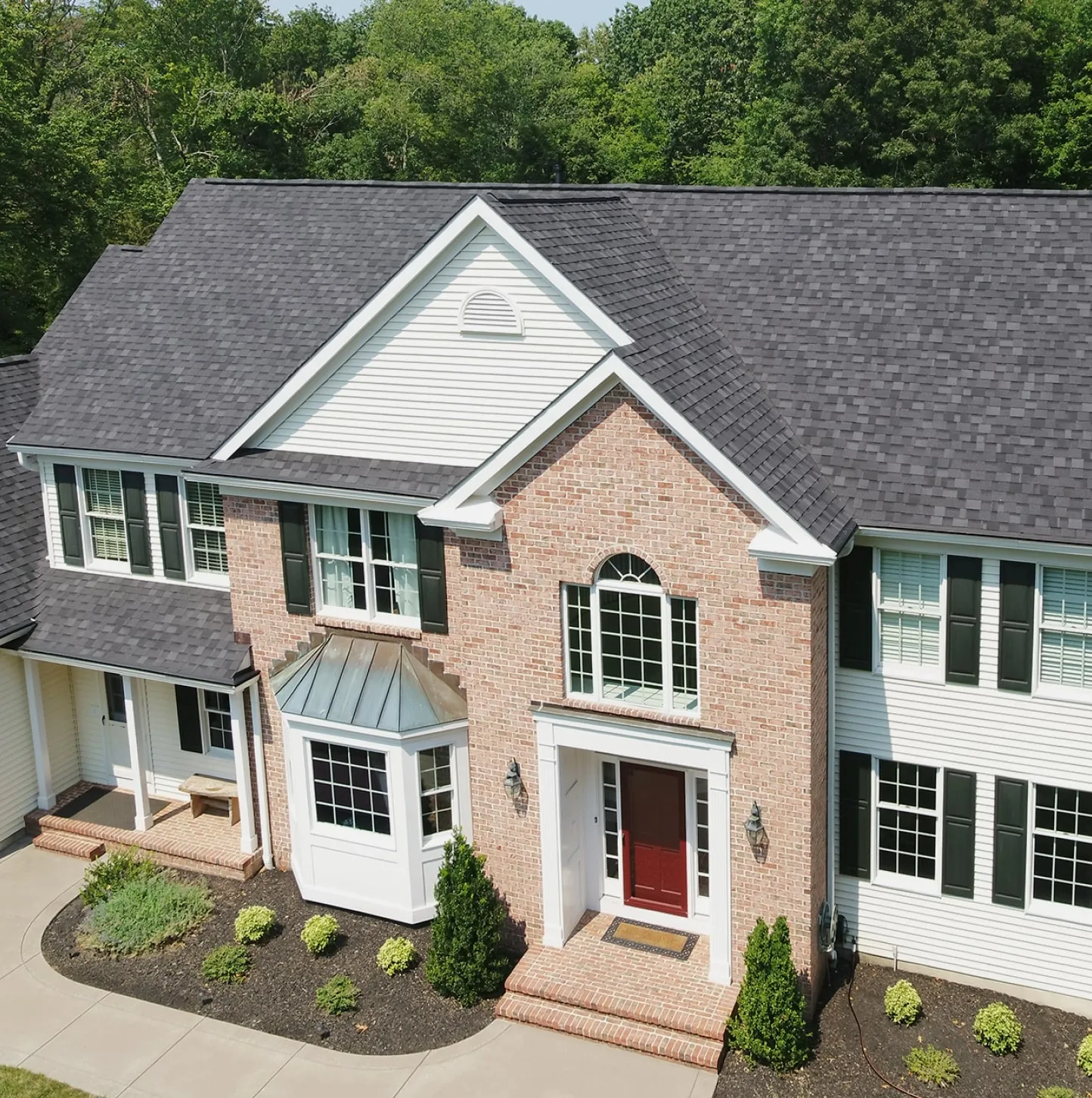 IKO Nordic Class 4 shingles in Granite Black installed on home