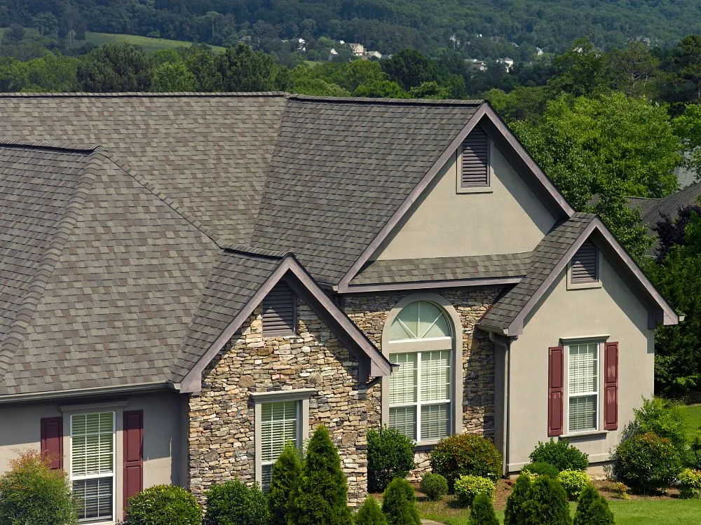CertainTeed Landmark Class 3 shingles in Weathered Wood on home with red shutters