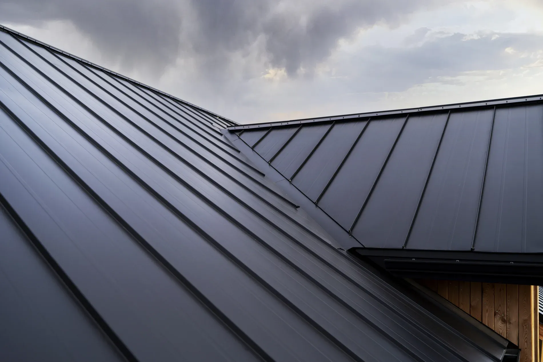 Standing seam metal roof installed on modern residential home