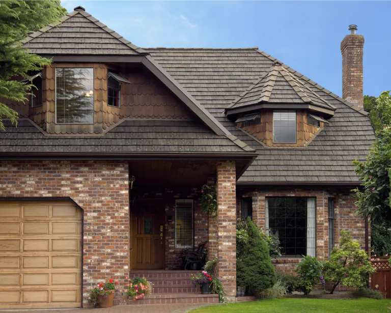 Euroshield Beaumont Shake recycled rubber roofing installed on brick home