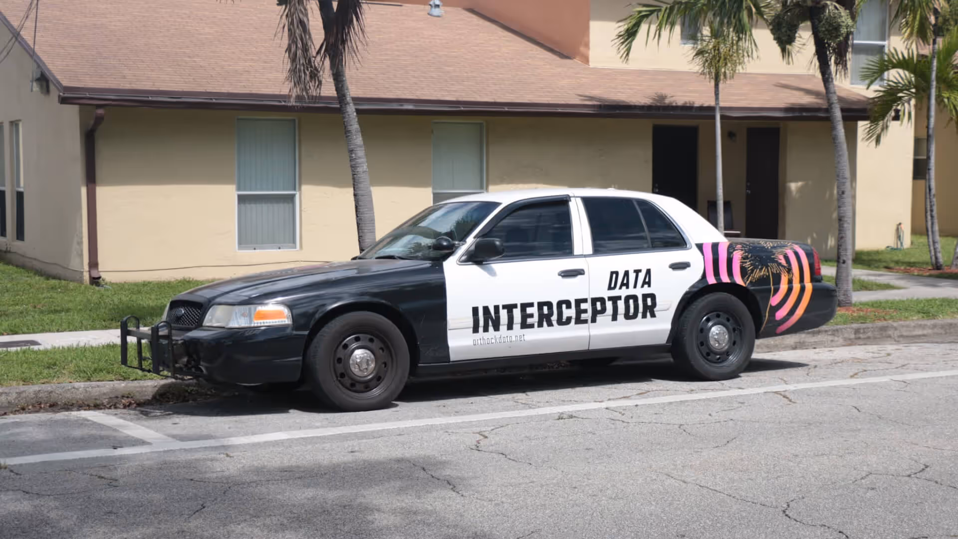 Wisper logo over a glb of a crater with a grid texture