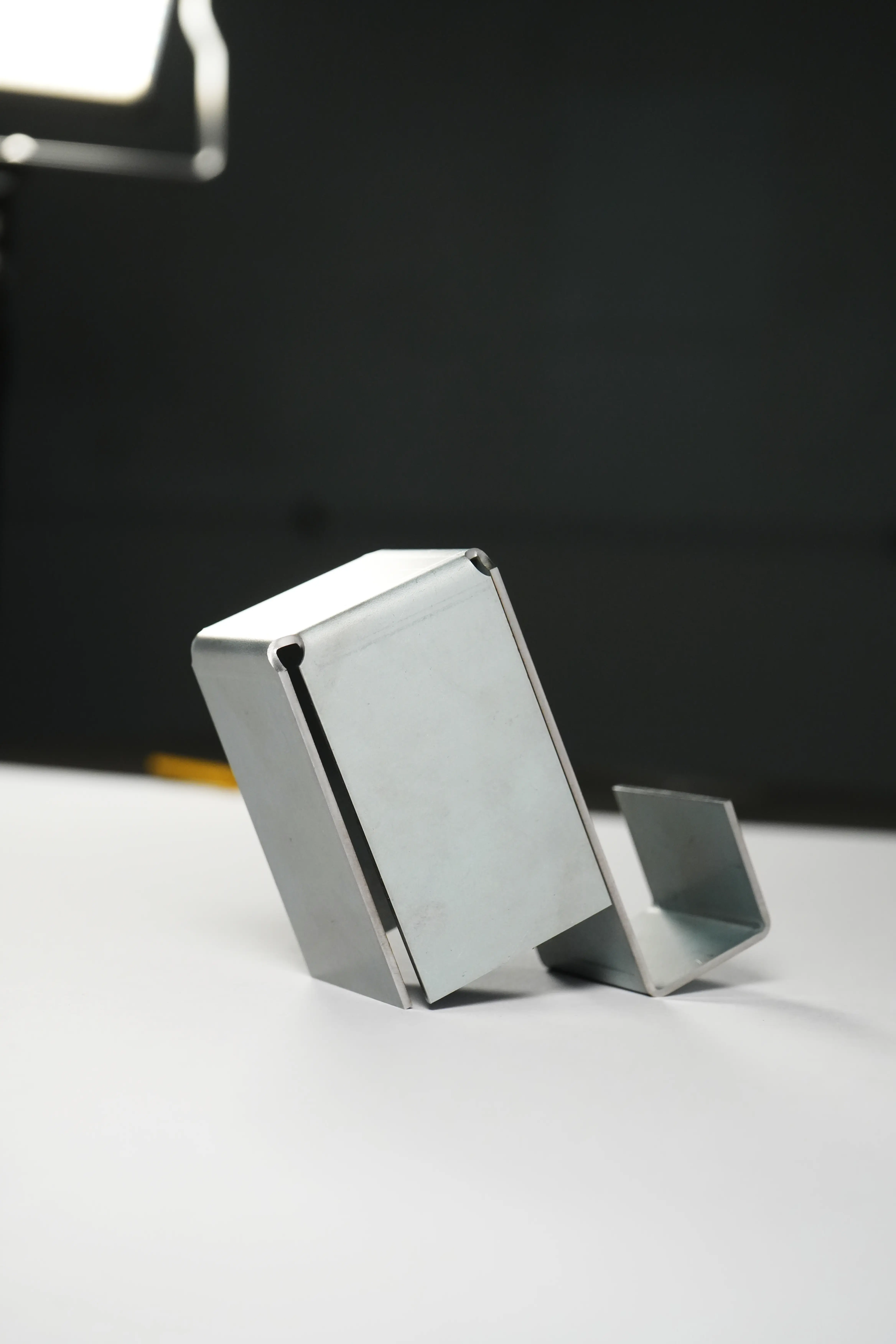 Two small bent sheet metal channels