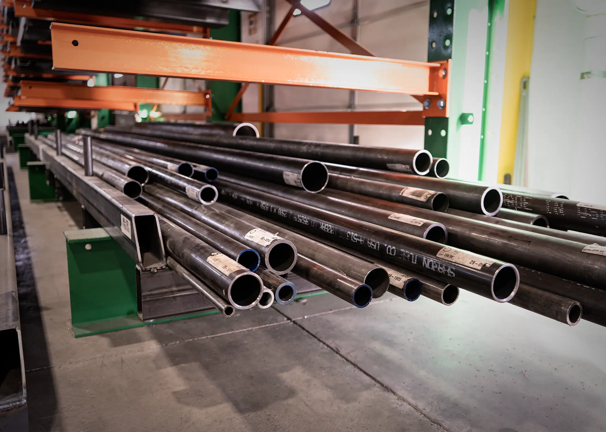 Round steel tubes stored on a rack