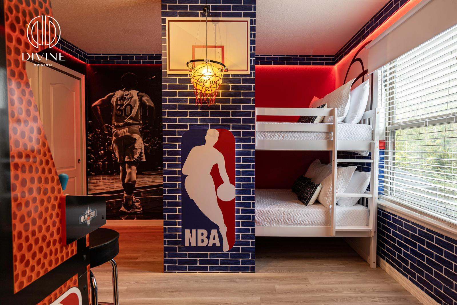 Basketball-themed bedroom with bunk beds, NBA logo wall, and Curry basketball mural.