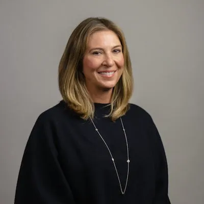 Amy Carr portrait headshot with grey background