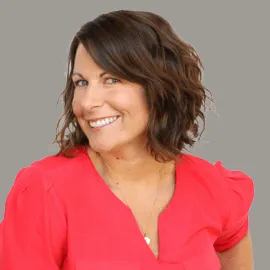 Stephanie Ranson portrait headshot with grey background