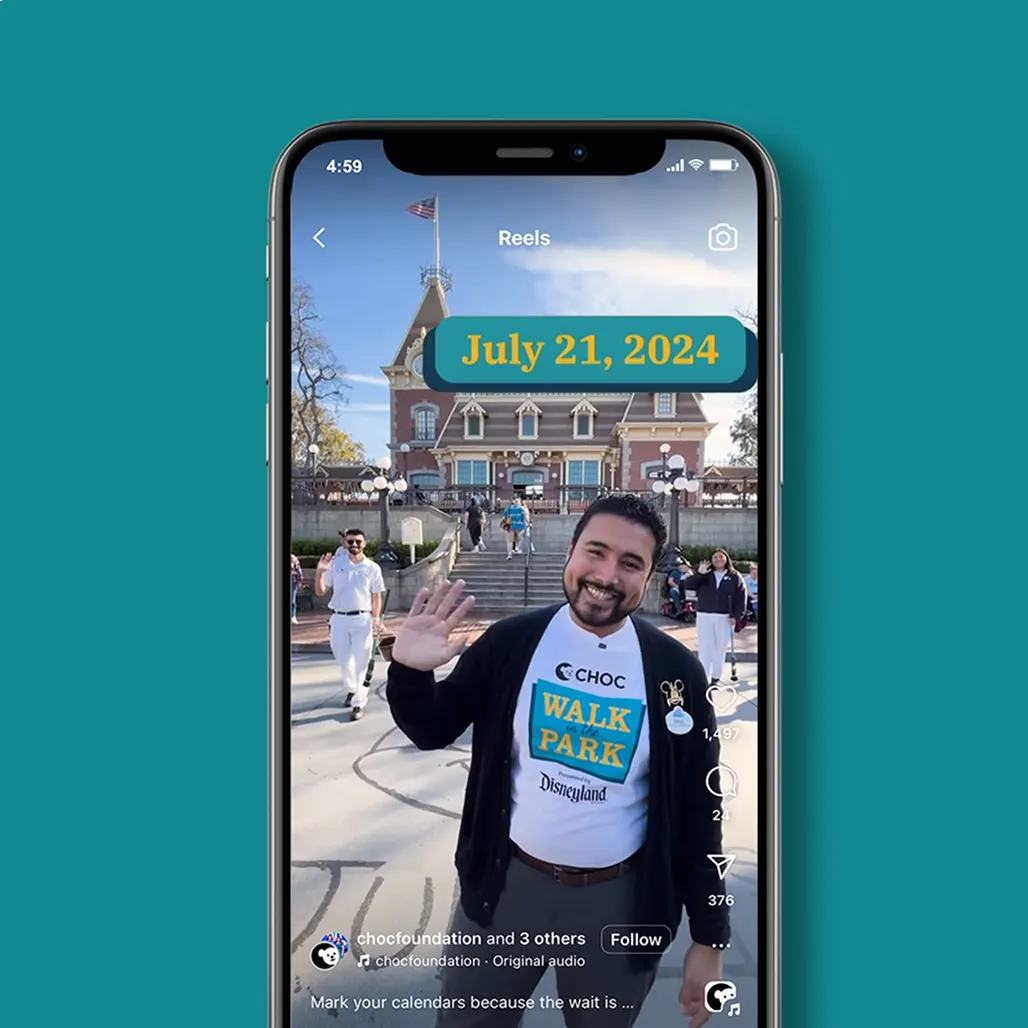 Smartphone mockup of an Instagram Reel showing a man in a CHOC Walk tee waving at the Disneyland train station, with a "July 21, 2024" date graphic overlaid.