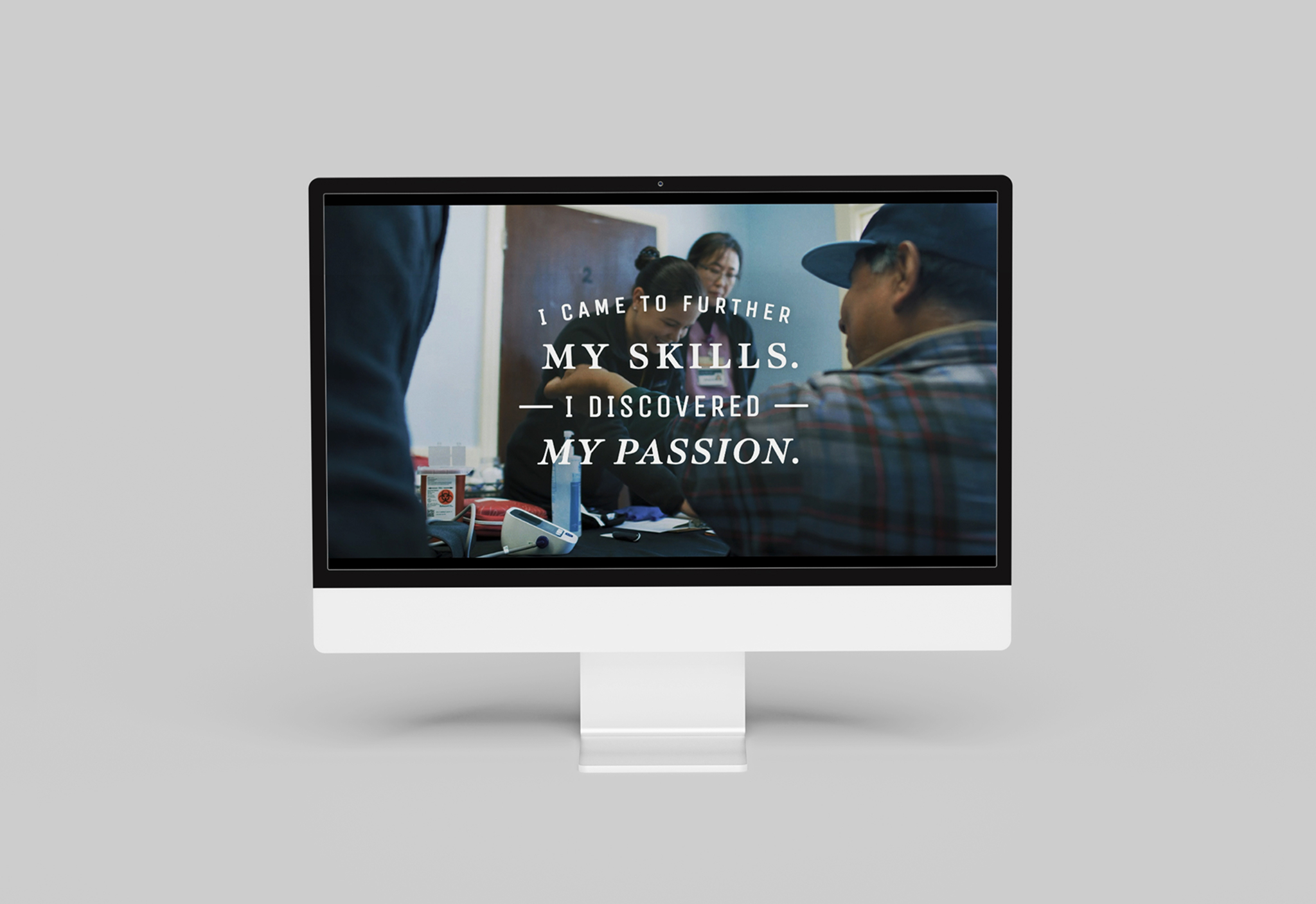 iMac mockup displaying a PLNU video frame with headline "I came to further my skills. I discovered my passion." over a workshop scene.