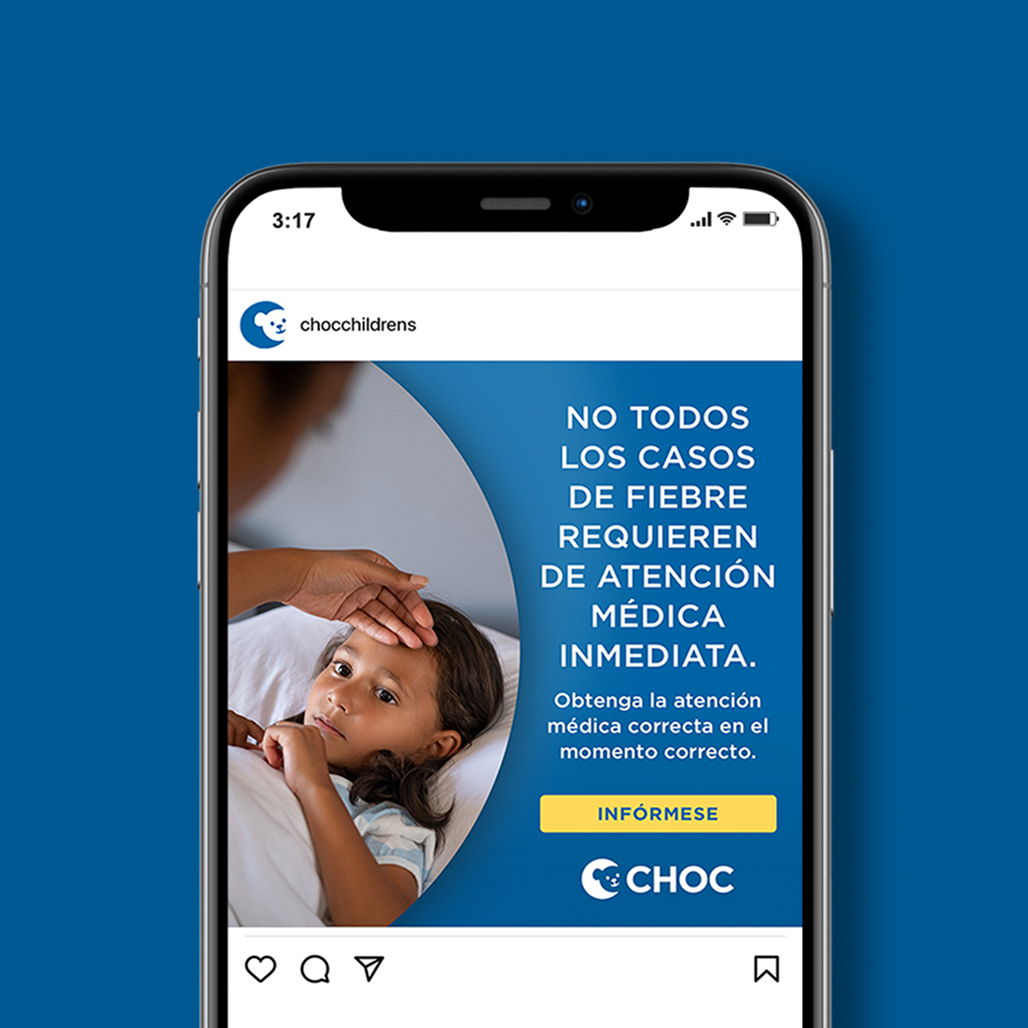 Phone mockup of CHOC Instagram ad with parent's hand on child's forehead and Spanish headline "No todos los casos de fiebre requieren de atención médica inmediata."