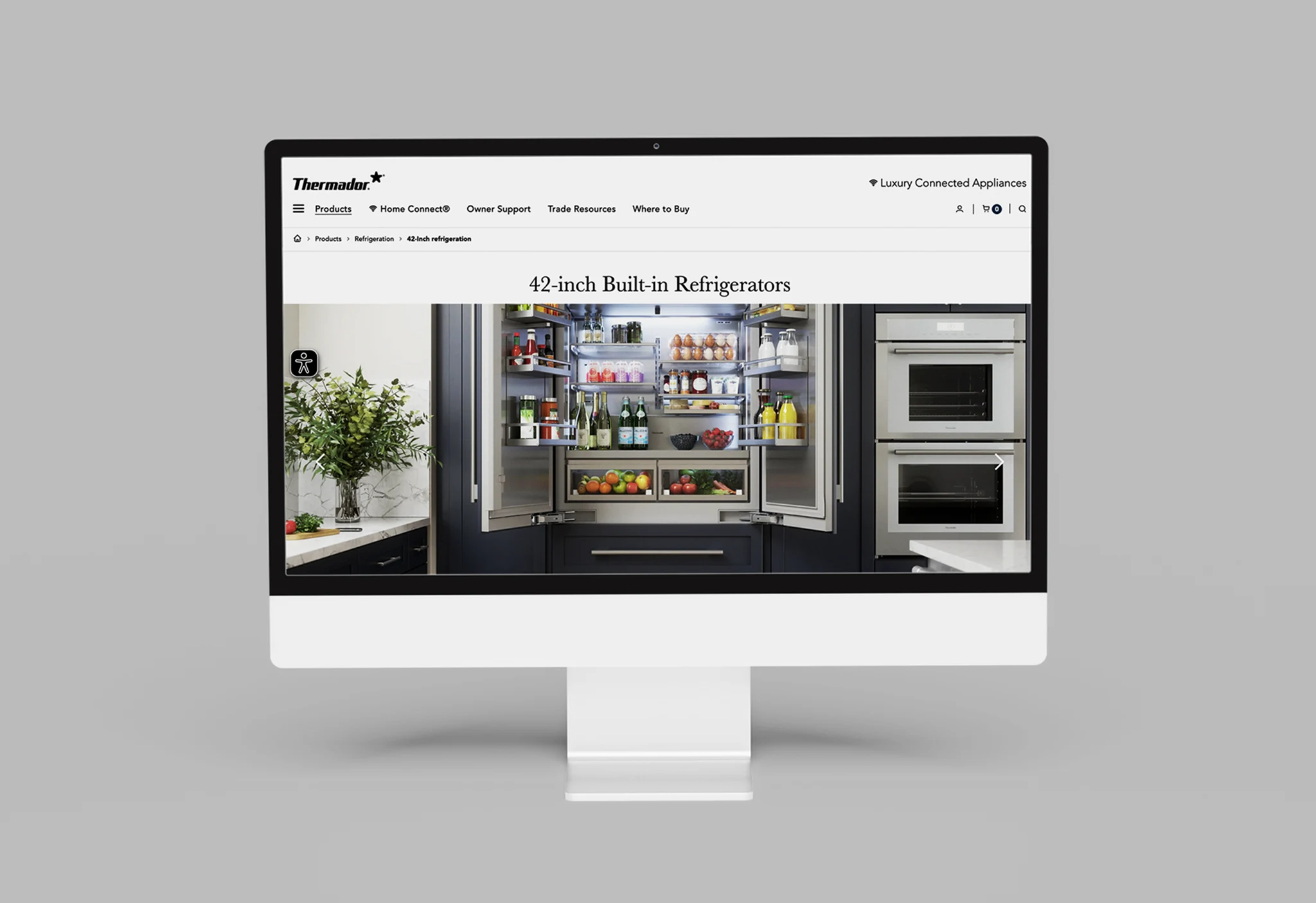 Desktop monitor displaying the Thermador 42-inch Built-in Refrigerators product page with an open French door fridge stocked with food.