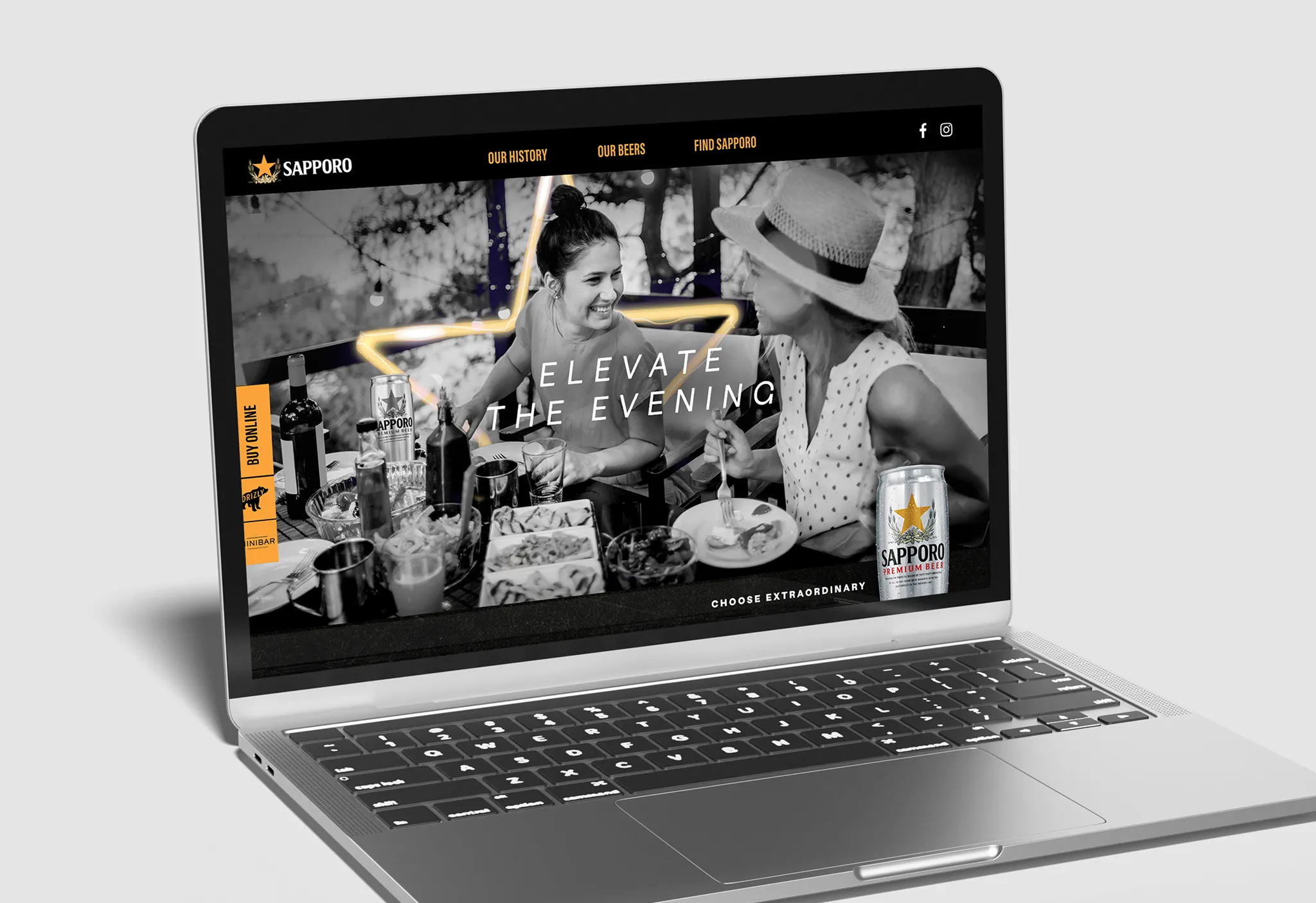 Laptop displaying Sapporo beer website. Two women enjoy a meal with drinks, smiling. Text reads “Elevate the Evening” with a relaxed, social vibe.